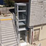 Élévateur PMR extérieur Arealift DOMOFLEX pylône vitré autoporteur Paroisse Saint Thomas Saint-Martin-d'Hères Isère – Premier Ascenseurs